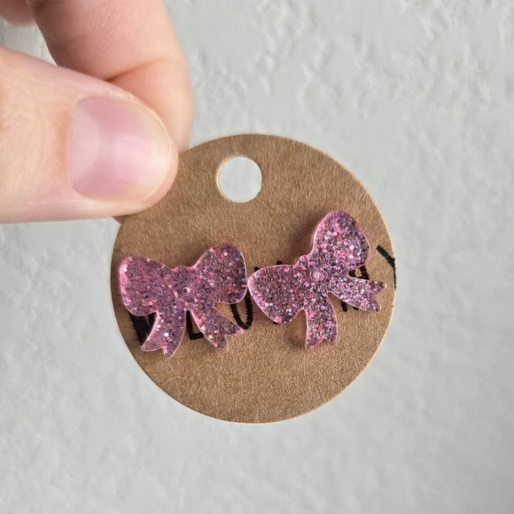 Willow May Pink Sparkle Acrylic Bow Earrings